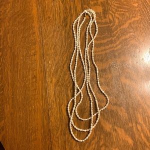 Triple strands fresh water pearls.